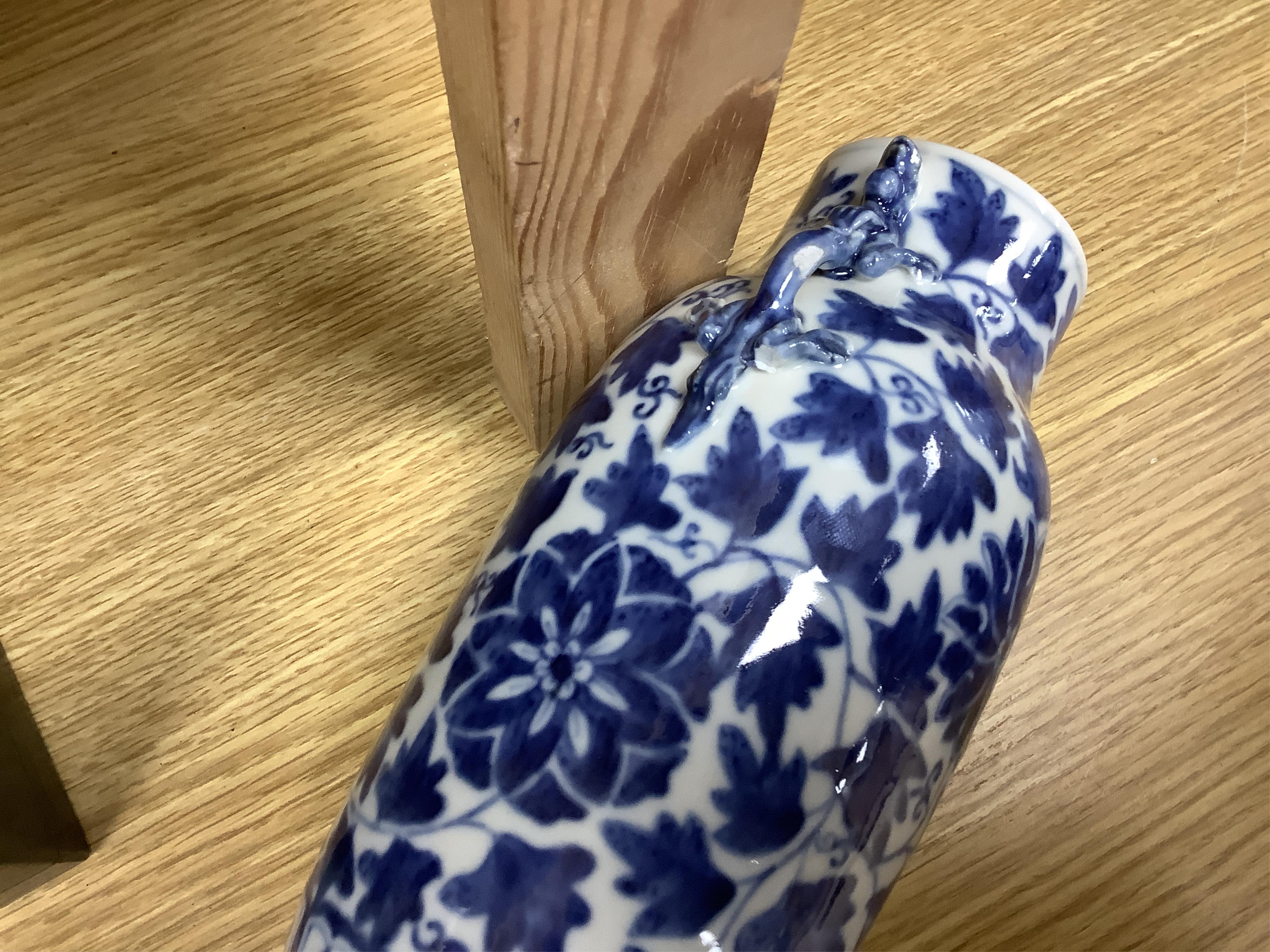 A late 19th century Chinese blue and white vase and cover and two Japanese Satsuma pottery vases, largest 24cm high